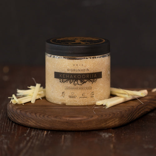HOIA Lemongrass Body Scrub on a wooden board